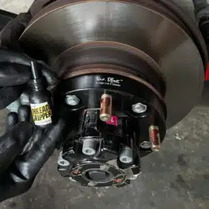 Step 6: Apply Mr Offset® Threadgripper to the wheel spacer embed studs this time.